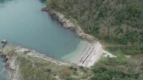 Churston Cove Devon high shot looking down at beach and rocky coastline Stock Footage 288094119