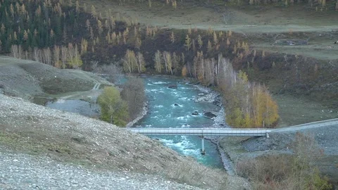 Chuya River. View of the bridge over the river from the hill Stock Footage 265016794