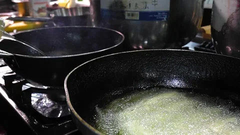 Chvishtari, Georgian cornbreads with cheese inside, fried in frying pan in oil. Stock Footage 267279562