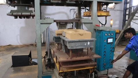 Ci casting foundry is making sand molds with a press machine. Stock Footage 252568675
