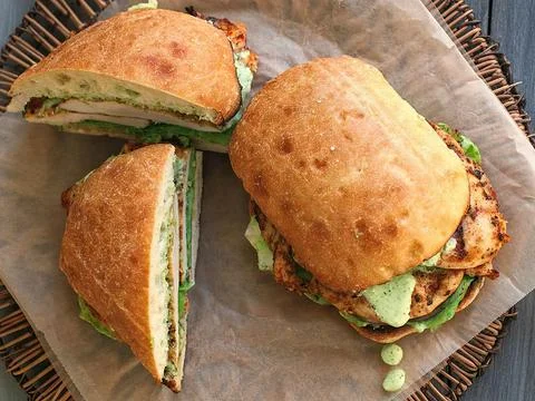 Ciabatta bread filled with chunks of chicken meat Stock Photos