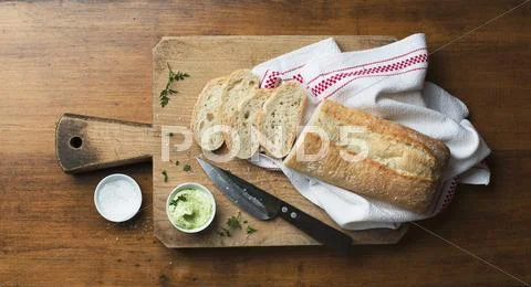 Ciabatta with herb butter Stock Photos