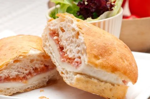 Ciabatta panini sandwich with parma ham and tomato Stock Photos