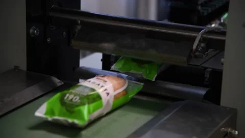 Ciabatta sandwiches in packaging machine Stock Footage 239191806