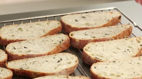 Ciabatta slices on an oven rack Stock-Footage 24670551