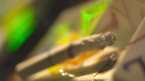 Ciagrette Long Ash Going In and Out of Focus Party Stock Footage 148121714