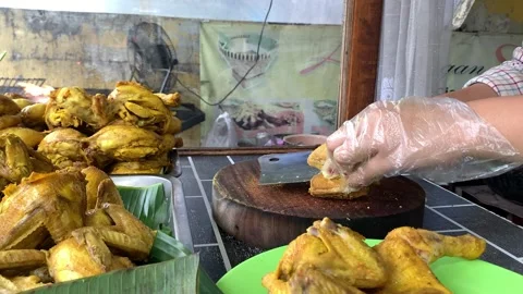 Cianjur, West Java, Indonesia. 06 January 2024. typical Sundanese food, fried ch Stock Footage 262419901