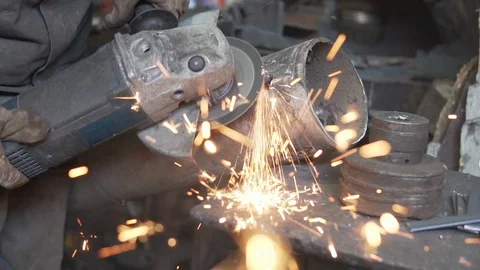 Cicular saw working metal in Souk Marrakech Morocco with sparks awesome bokeh Stock Footage