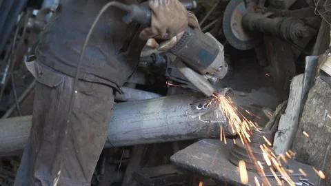 Cicular saw working metal in Souk Marrakech Morocco sparks Stock Footage 87459542