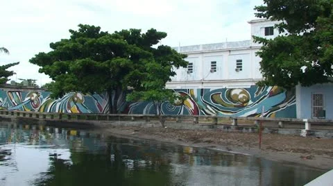 Cienfuegos, waterfront with art on wall Stock Footage
