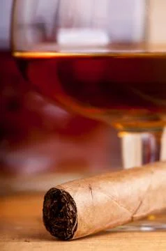 Cigar and brandy Stock Photos