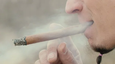 Cigar smoking close up Stock Footage 106046411