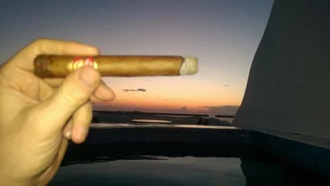 Cigar Sunset Pool Stock Photos