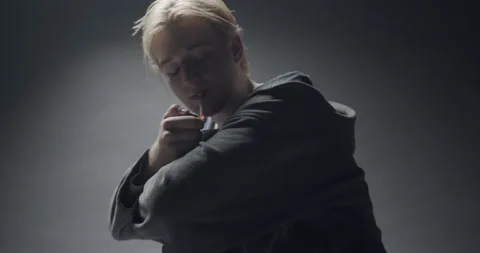 Cigarette after crying Stock Footage 163747505