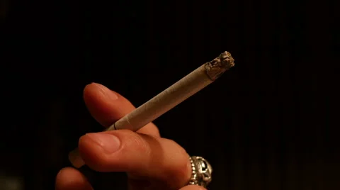 Cigarette against black background Stock Footage 44782779