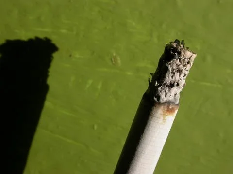 Cigarette and ash Stock Photos
