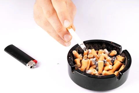 Cigarette and ashtray Stock Photos