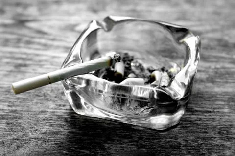 Cigarette and ashtray Stock Photos
