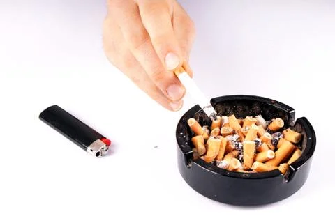 Cigarette and ashtray Stock Photos