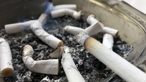 Cigarette in ashtray Stock Footage 106243352