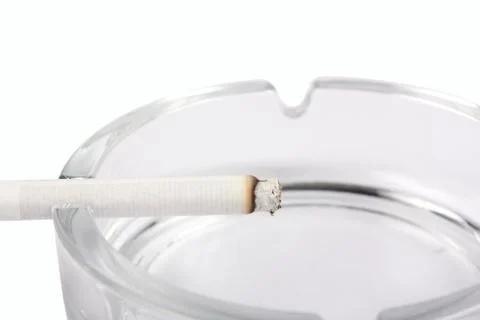 Cigarette on ashtray Stock Photos