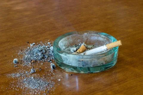 A cigarette in an ashtray Stock Photos
