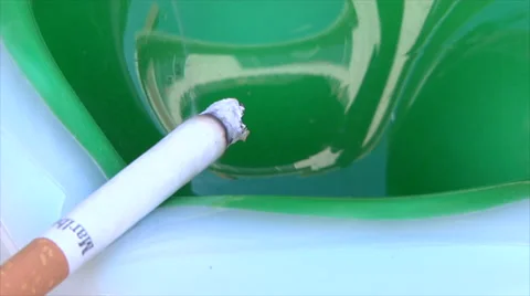 Cigarette &amp; Ashtray Tight Stock Footage 55489411