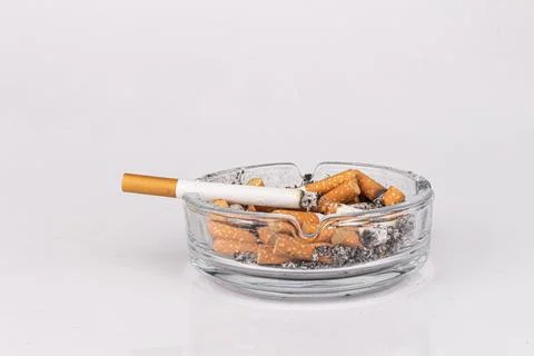 Cigarette ashtray white background ash smoke butt Stock Photos
