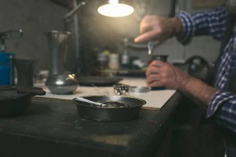 Cigarette on ashtray in workshop Stock Photos