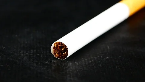 Cigarette on black background Stock Footage 87216184