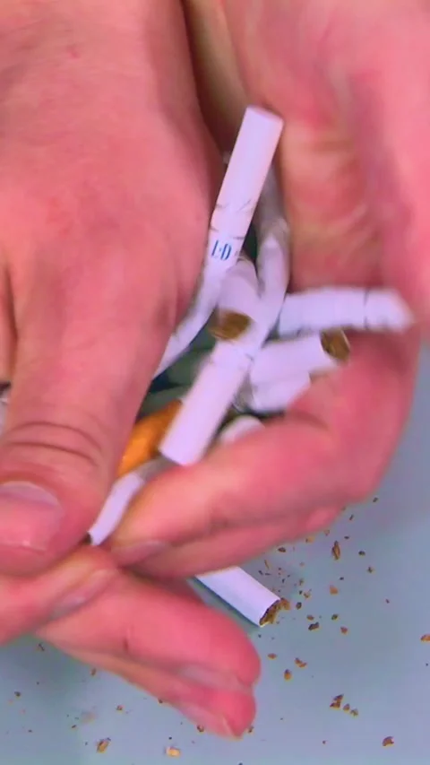Cigarette break in her hand close-up Stock Footage 249310673