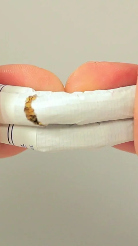 Cigarette break in her hand close-up Video stock 249310848