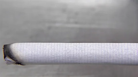 Cigarette Burning on Ashtray -   time lapse, speed 30x, close up, detail, macro Video stock 82838576