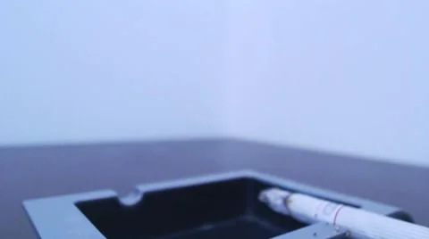 Cigarette burning in ashtray2 Stock Footage 41894696