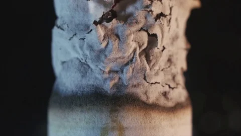 Cigarette Burning Down and Crumbling Stock Footage 74522732