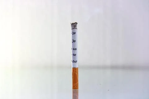 Cigarette burning life concept Stock Photos
