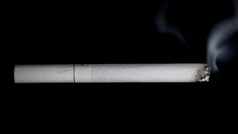 Cigarette Burning Timelapse on a Black Dark Background Stock Footage 86434316