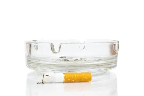 Cigarette butt in the ashtray Stock Photos