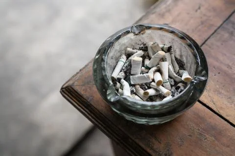 Cigarette butt in ashtrey 库存照片