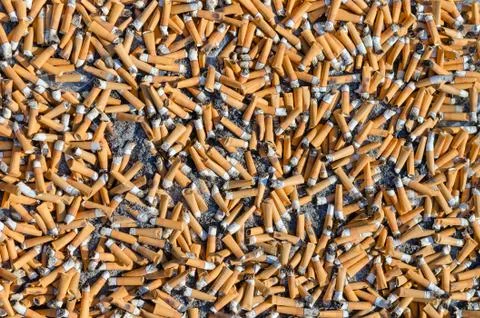 Cigarette butts, background Stock Photos