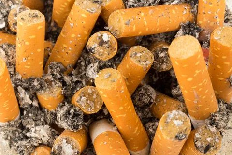Cigarette butts background texture Stock Photos