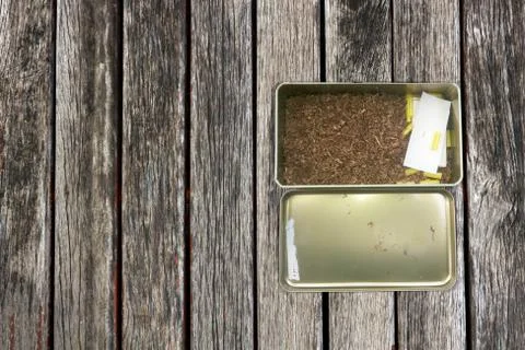 Cigarette case on Wood background Stock Photos