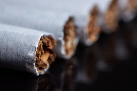 Cigarette, cigarette on black background, pack of cigarettes, close-up of a.. Stock Photos
