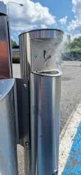Cigarette disposal bin on fire Stock Photos