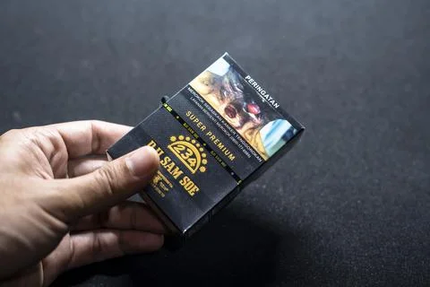 Cigarette Dji Sam Soe Filter on isolated background Stock Photos