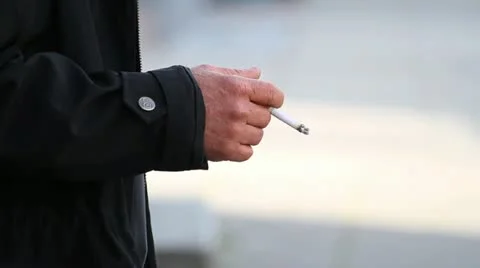 Cigarette in hand, closeup 스톡 동영상 18195663