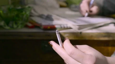 Cigarette in hand Stock Footage 62546634