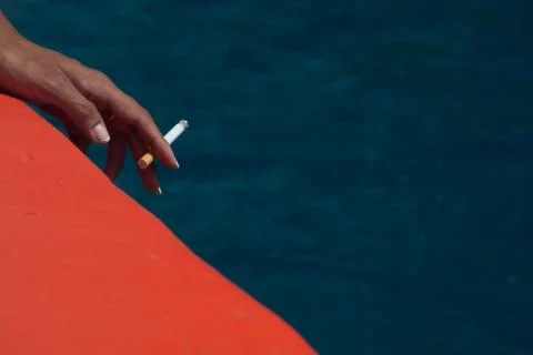 Cigarette in hand Stock Photos