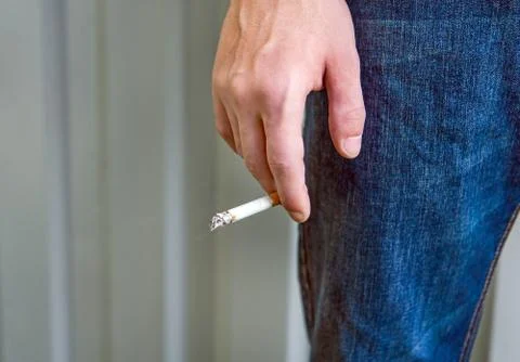 Cigarette in the Hand Stock Photos