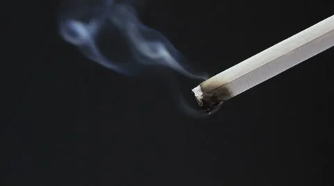 Cigarette isolated on black background _3 Video stock 8519633
